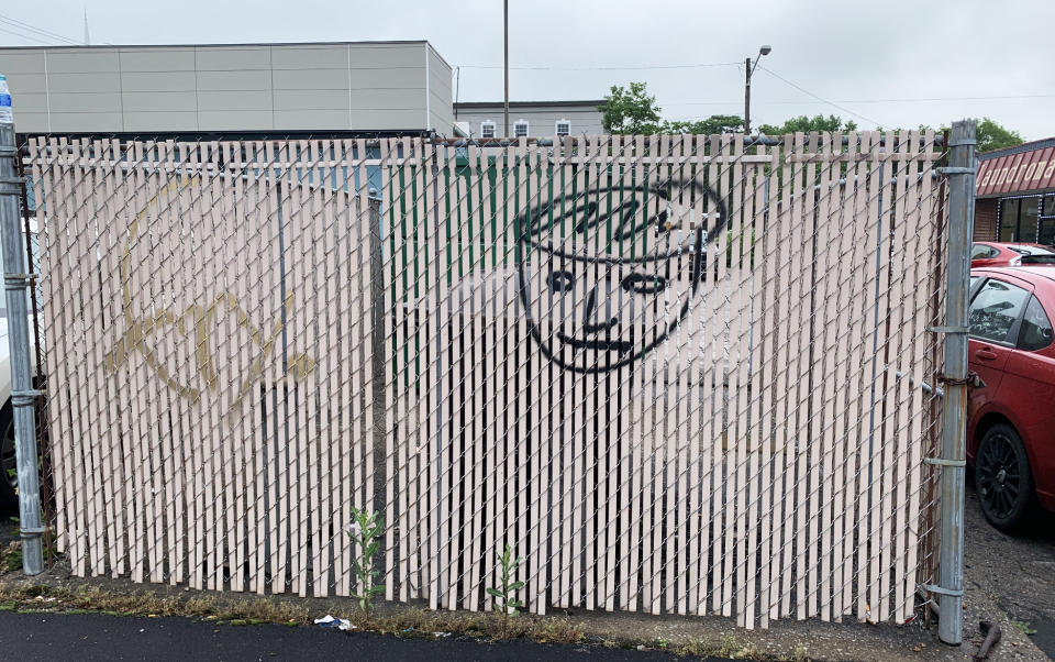 Fence with graffiti on it (Courtesy Alaina Schwartz)