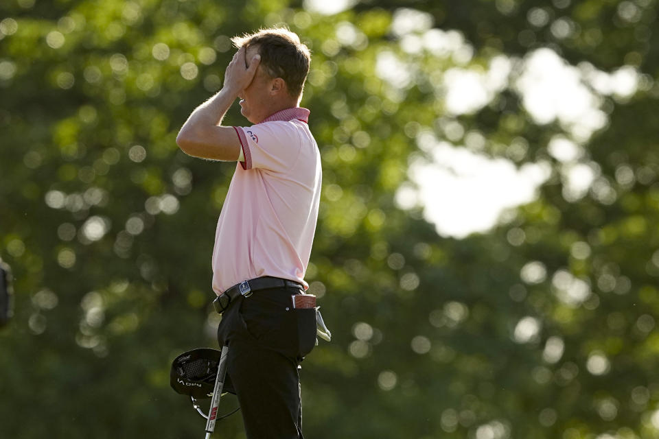 Justin Thomas celebrates after winning the PGA Championship golf tournament in a playoff against Will Zalatoris at Southern Hills Country Club, Sunday, May 22, 2022, in Tulsa, Okla. (AP Photo/Matt York)