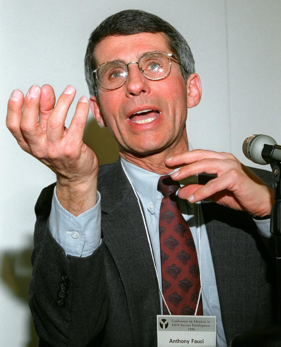 In this Feb. 12, 1996, file photo, Dr. Anthony Fauci gestures during a news conference to announce a plan to speed the search for an AIDS vaccine through partnerships with drug companies.