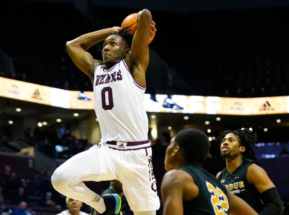 Missouri State's Chance Moore goes up for a dunk as the Bears take on the Purdue Fort Wayne Mastodons at GSB Arena on Saturday, Dec. 10, 2022.