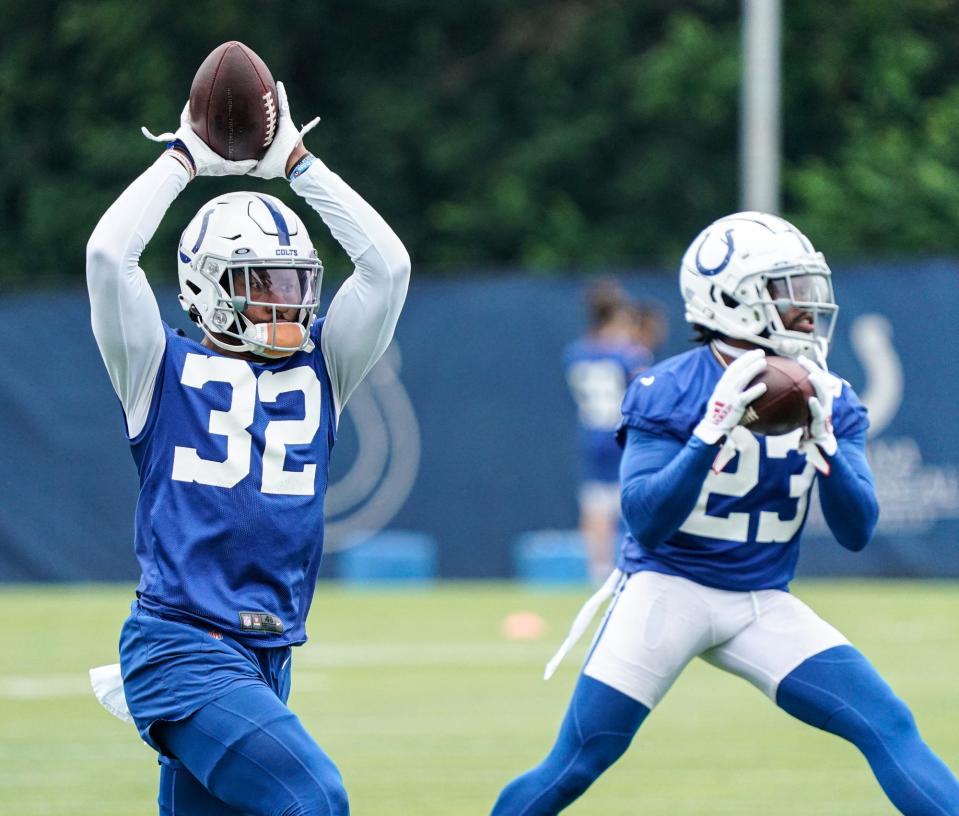 Colts players, Julian Blackmon (32) and Kenny Moore II (23) run drills during the Colts mandatory mini training camp on Tuesday, May 7, 2022, at the Indiana Farm Bureau Football Center in Indianapolis. 