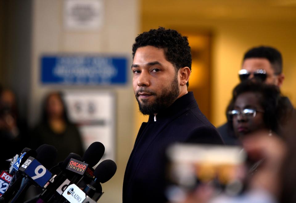 Actor Jussie Smollett talks to the media before leaving Cook County Court after his charges were dropped, Tuesday, March 26, 2019, in Chicago.