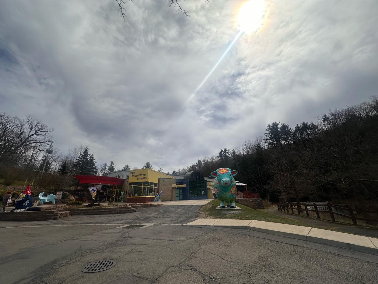 Cloudy skies hover over the Discovery Center of the Southern Tier just before 2 p.m. Monday, April 8, 2024.