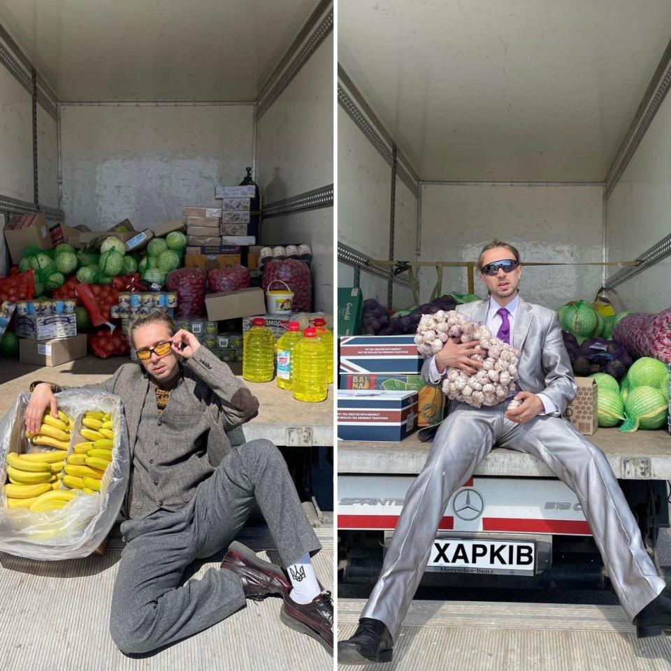 Comedian and volunteer Slava Kedr poses for a photograph with humanitarian aid he helped to raise money for in 2022. (Slava Kedr/Instagram)