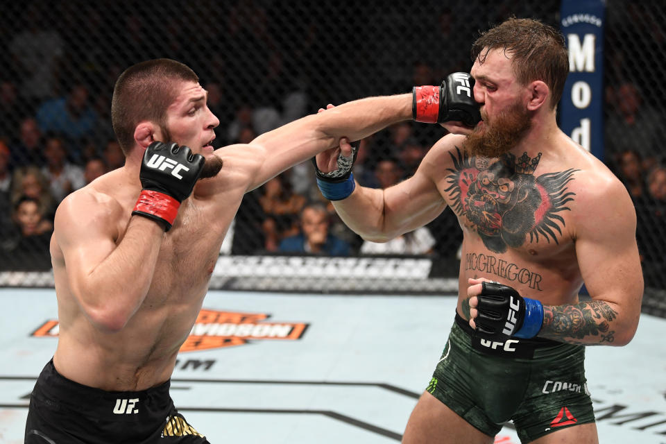 Khabib Nurmagomedov punches Conor McGregor in their UFC lightweight championship bout Saturday in Las Vegas. (Photo by Josh Hedges/Zuffa LLC/Zuffa LLC)