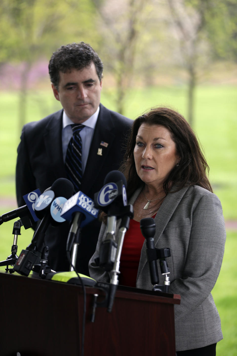 Rep. Mike Fitzpatrick, R-Pa., looks on as Ellen Saracini, whose husband Victor was the captain of United Airlines Flight 175 that crashed into the World Trade Center on Sept. 11, 2001, speaks during a news conference at the at the Garden of Reflection memorial to local victims of the 9/11 terrorist attacks, Monday, April 29, 2013, in Yardley, Pa. Fitzpatrick proposed new legislation aimed at protecting airline passengers and pilots from the kind of terrorist attack upon the nation a dozen years ago. (AP Photo/Matt Rourke)