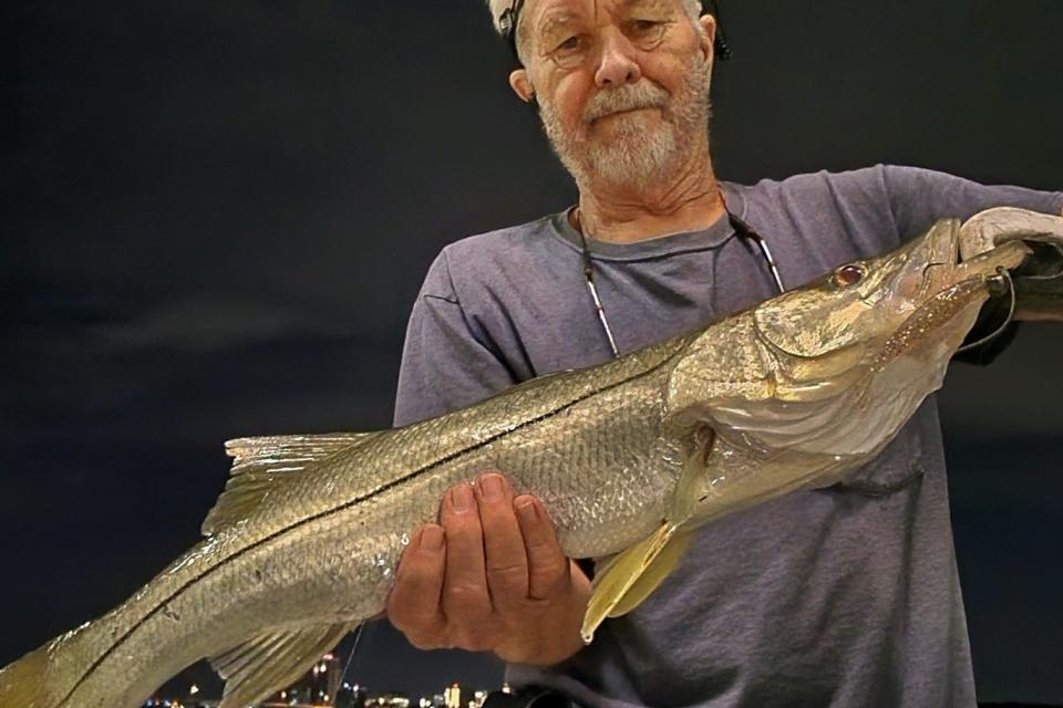 John Sasser of St. Petersburg caught this slot size snook while fishing at John's Pass this week.