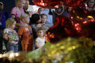 <p>People pause at a memorial set up for victims of a mass shooting in Las Vegas, Nev., Tuesday, Oct. 3, 2017. (Photo: John Locher/AP) </p>