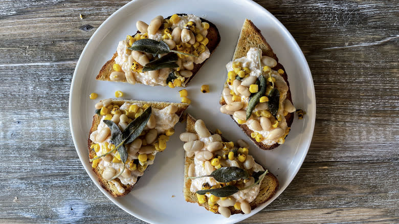 plate with ricotta squash toast