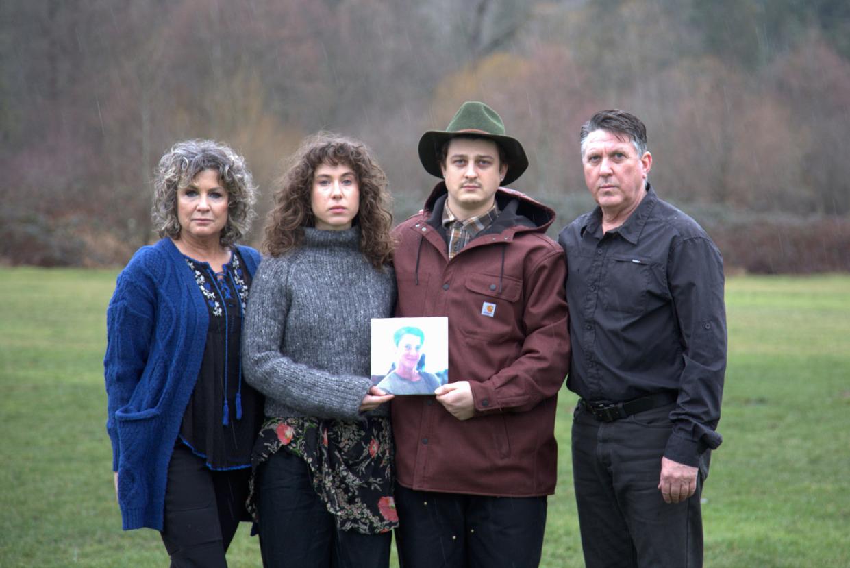 In this undated image provided by Haylee Wendling, family members of Colin Conner pose for a photo as they hold an image of Colin. Conner, who struggled with opioid addiction for years, lost his life to a fentanyl overdose in June 2023, just days after being released from a Salt Lake City jail. Conner's father said the jail had discontinued his methadone prescription, causing him to go through agonizing withdrawal and prompting cravings to return while he was behind bars. (Haylee Wendling via AP)