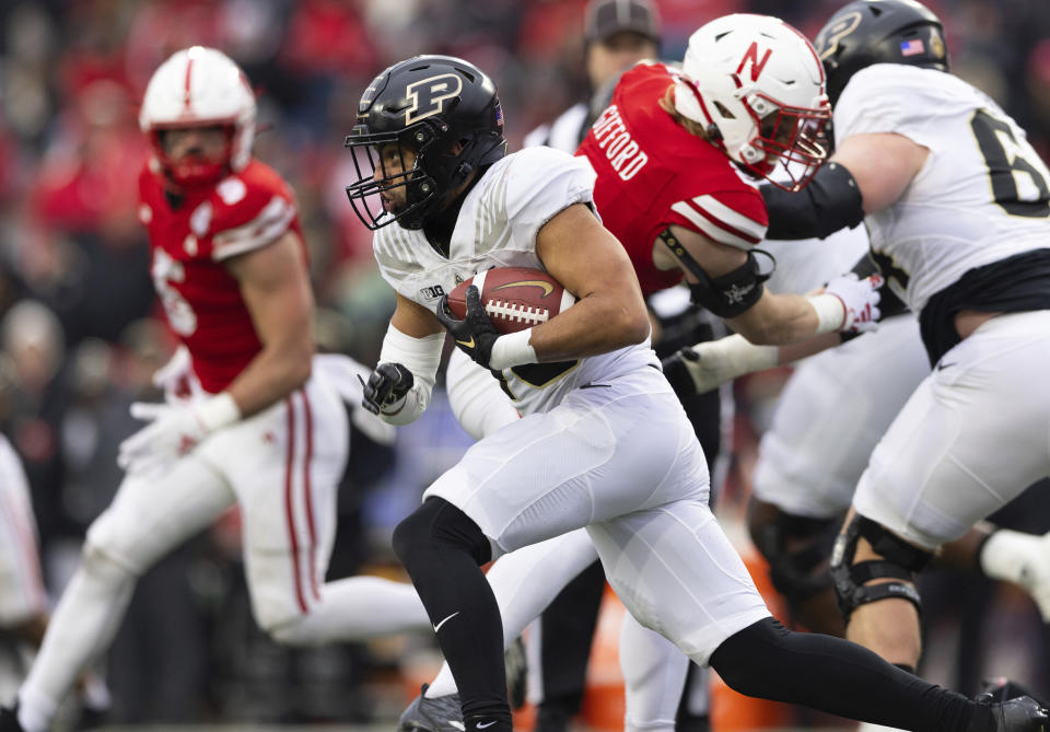 Purdue's Devin Mockobee carries the ball against Nebraska during the second half of an NCAA college football game Saturday, Oct. 28, 2023, in Lincoln, Neb. (AP Photo/Rebecca S. Gratz)