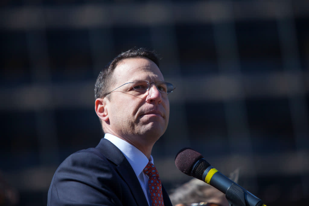 Pennsylvania Attorney General Josh Shapiro at the microphone.