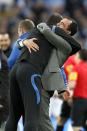 Wigan Athletic manager Roberto Martinez (right) celebrates winning the FA Cup final on the pitch after the game