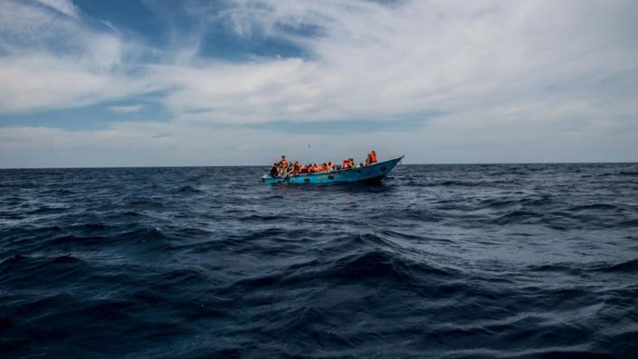 Migrants on a ship in the Mediterranean Sea.