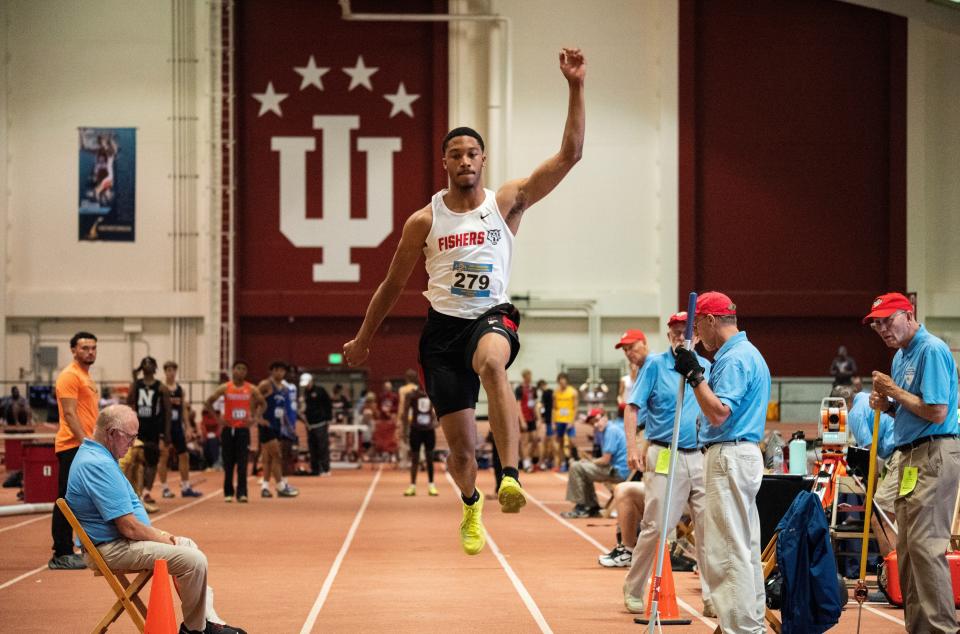 Fishers’ JonAnthony Hall competes in the long jump during the IHSAA Boys State Track & Field Finals at the Robert C. Haugh Track & Field Complex on the campus of Indiana University in Bloomington on Saturday, June 1, 2024.