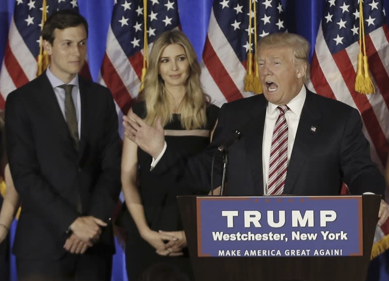 Republican U.S. presidential candidate Donald Trump speaks as his son-in-law Jared Kushner (L), daughter Ivanka listen at a campaign event at the Trump National Golf Club Westchester in Briarcliff Manor, New York, U.S., June 7, 2016.  REUTERS/Mike Segar/File Photo