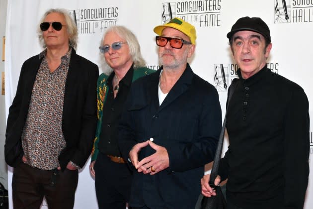 R.E.M.'s Peter Buck, Mike Mills, Michael Stipe and Bill Berry attend the Songwriters Hall of Fame 2024 induction - Credit: Angela Weiss/AFP via Getty Images