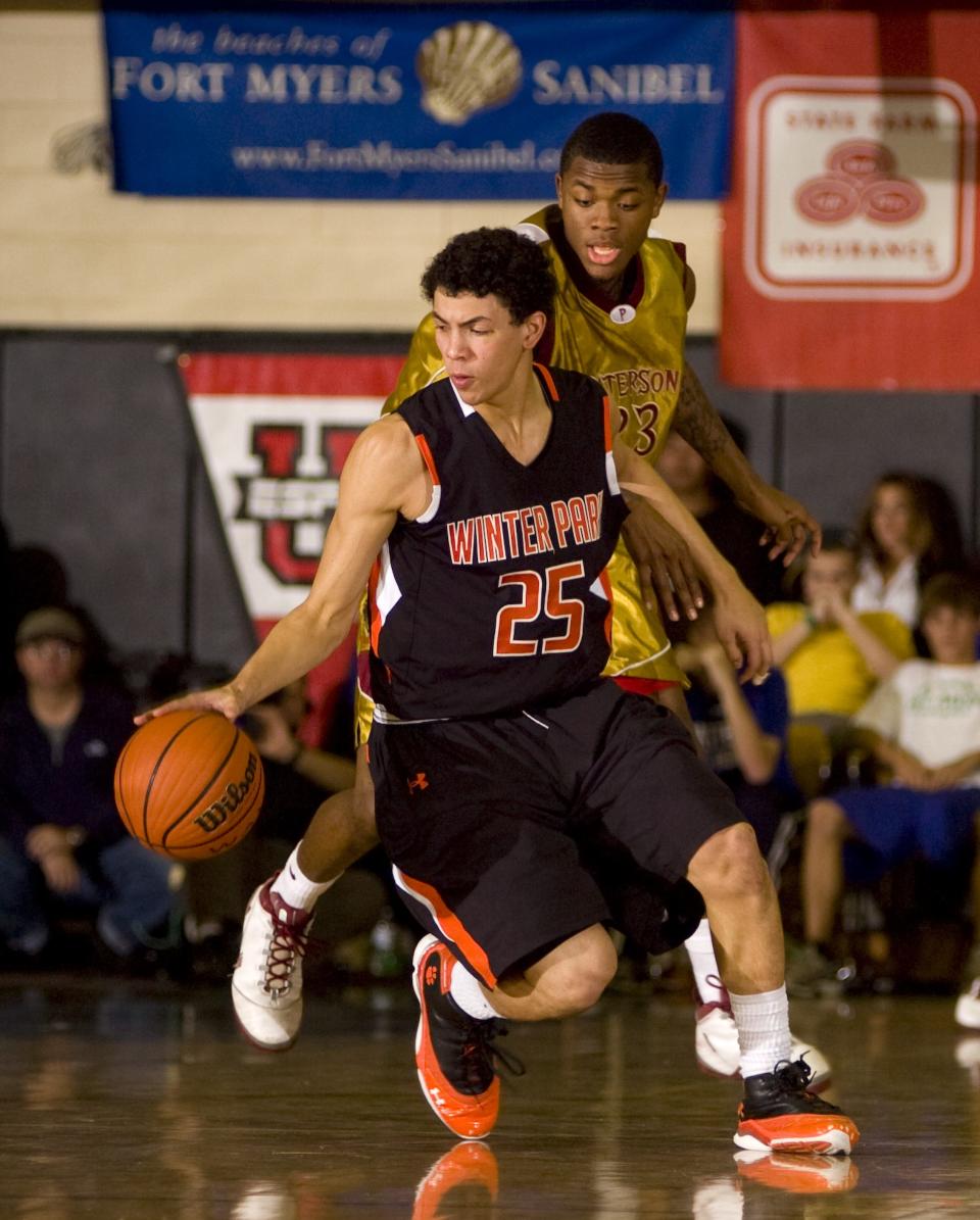 Winter Park's Austin Rivers dribbles around Paterson Catholic's Fuquan Edwin in the finals of the City of Palms Classic on Wednesday, December 23, 2009, at Bishop Verot High School in Fort Myers.