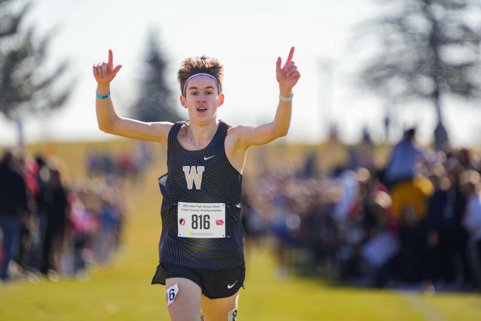 Landon Bendgen of Woodbine wins the Class 1A boys state cross country championship Friday in Fort Dodge.