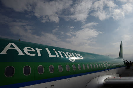 Passengers board an Aer Lingus Airbus A320 plane at the airport in Perpignan, France, September 9, 2018. REUTERS/Clodagh Kilcoyne