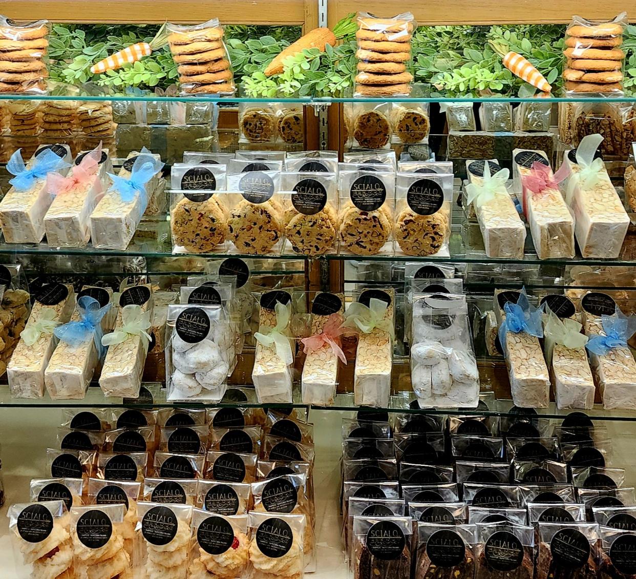 All the torrone, packaged cookies and biscotti at Scialos are ready for Easter shoppers. It's the last torrrone of the season. It will soon be too warm to produce the nouget candy made with honey and almonds.
