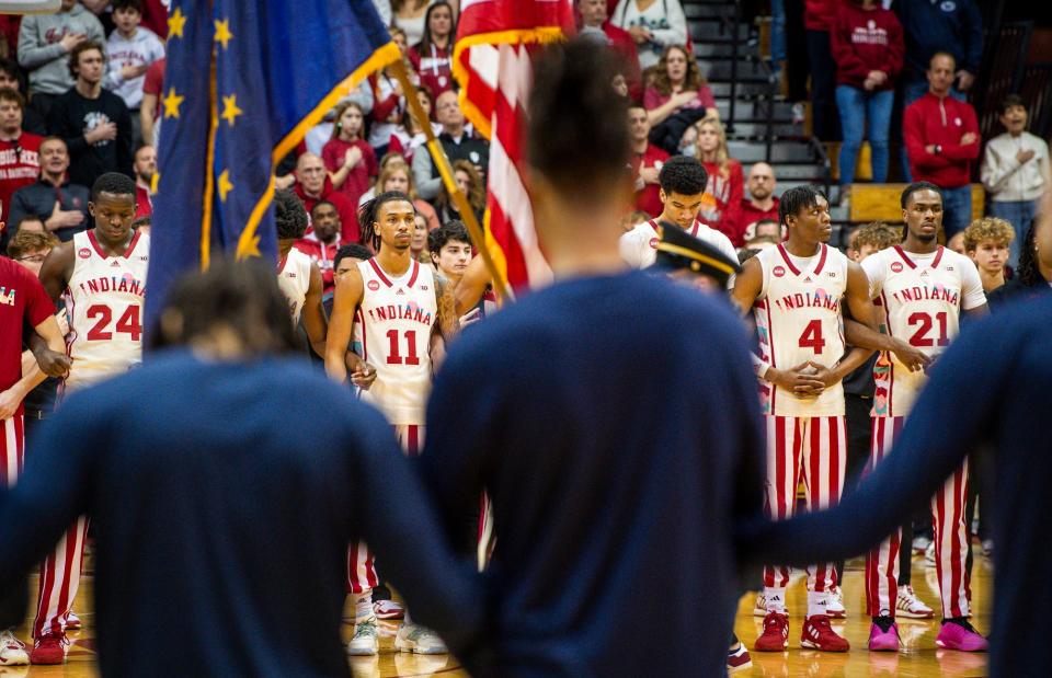 The Hoosiers stand for the National Anthem before the first half of the Indiana versus Penn State men's basketball game at Simon Skjodt Assembly Hall on Saturday, Feb. 3, 2024.