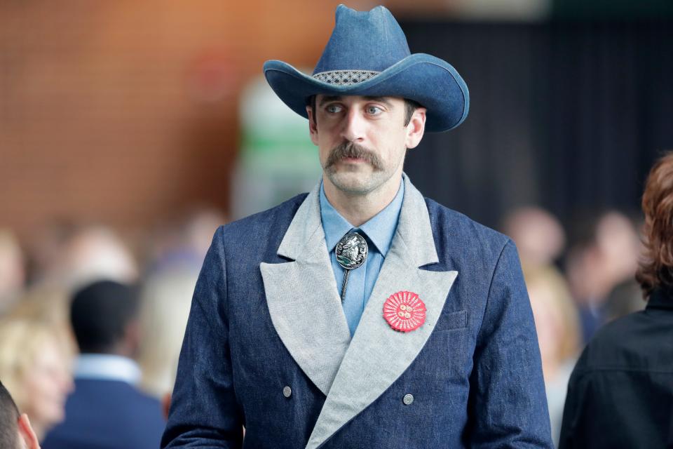 Packers quarterback Aaron Rodgers wore a custom denim tuxedo jacket to the team's luncheon in 2018.