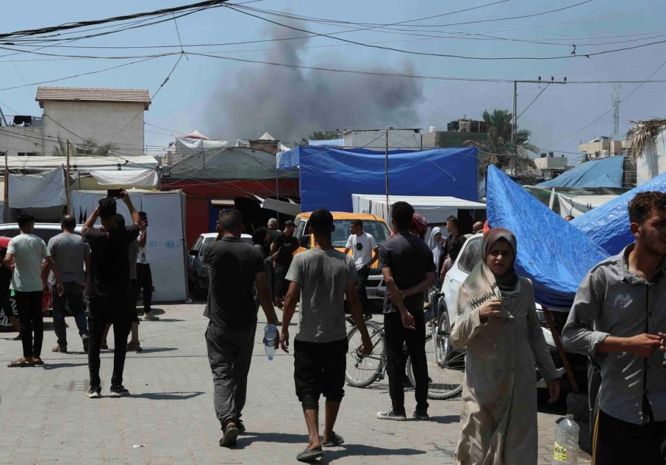 Smoke rises during an Israeli strikeon Deir Al-Balah (Reuters)