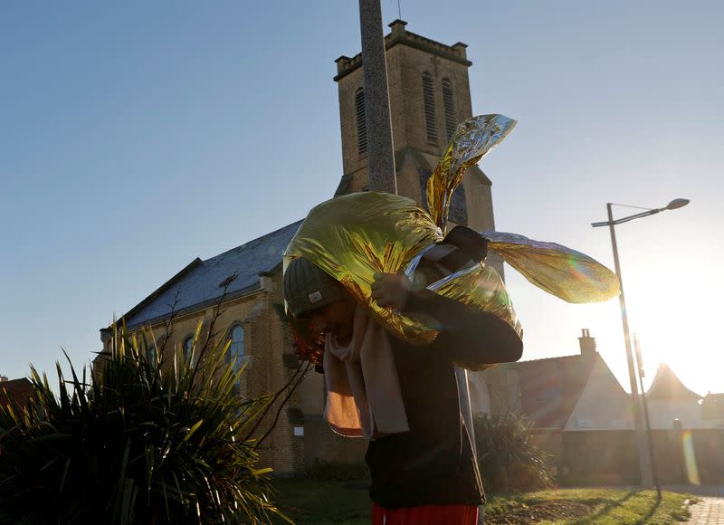 Migrants leave Sangatte community centre northern France