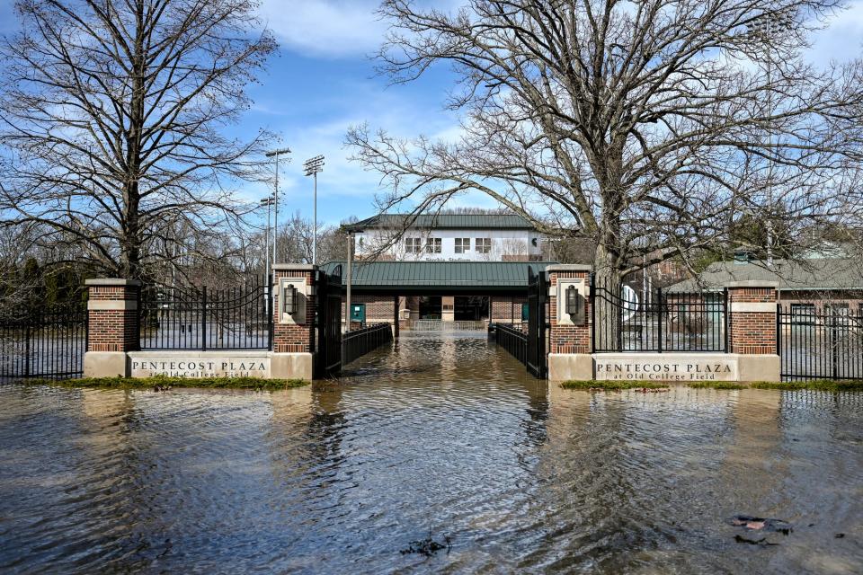 The entrance to Michigan State's Pentecost Plaza at Old College Field is flooded on Thursday, April 6, 2023, in East Lansing. The plaza is home to the McLane Baseball Stadium, the Secchia Softball Stadium and the DeMartin Soccer Stadium.