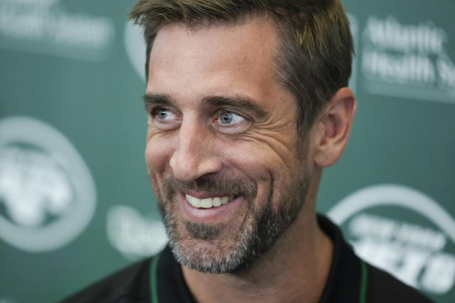 New York Jets' quarterback Aaron Rodgers talks to reporters after an NFL football press conference at the Jets' training facility in Florham Park, N.J., Wednesday, April 26, 2023. (AP Photo/Seth Wenig)