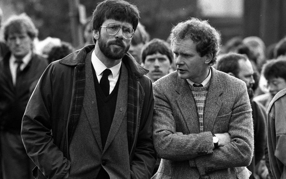 President of Sinn Fein, Gerry Adams and Martin McGuinness (right) at the funeral of Patrick Kelly, 30, the reputed IRA commander in East Tyrone - Credit: PA