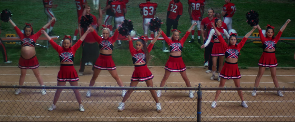 Cheerleading uniform, Cheerleading, Uniform, Team, Team sport, Sports, Majorette (dancer), Cheering, Sport venue, Sports uniform, 