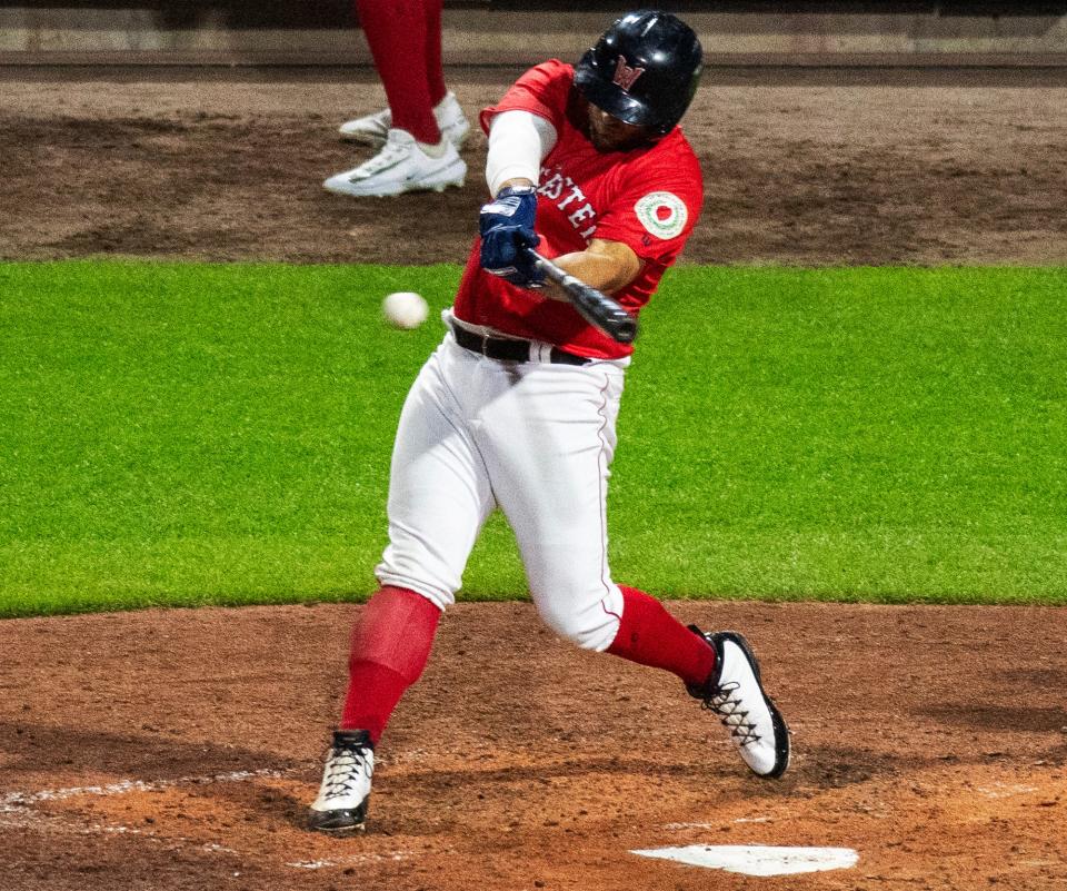 Daniel Palka hits a two-run single in the eighth inning for the WooSox Tuesday night.