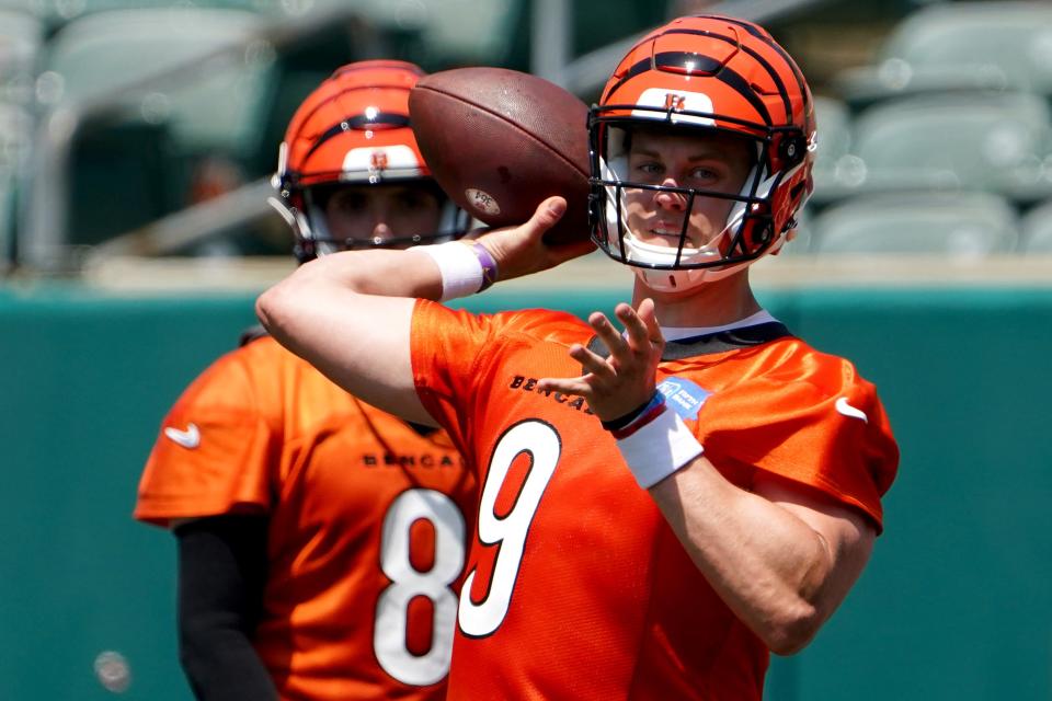 Cincinnati Bengals quarterback Joe Burrow (9) throws during organized team activities practice, Tuesday, June 14, 2022, at Paul Brown Stadium in Cincinnati.