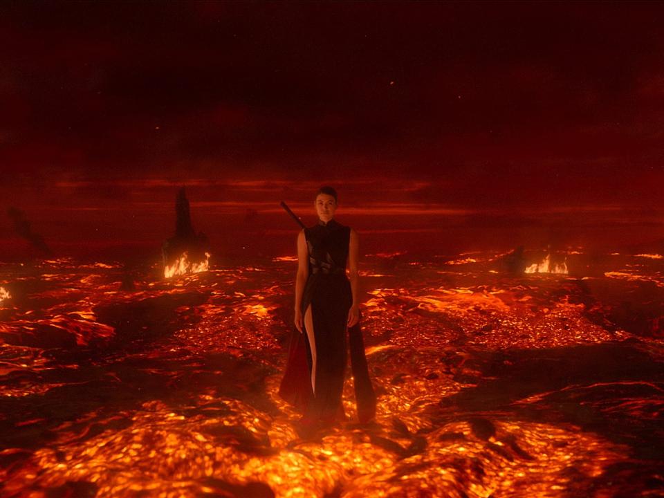 sophon in three body problem, a woman in a black dress with a sword strapped to her back, walking through a sea of lava and flame. she looks threatening and powerful