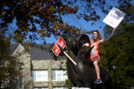 Grace Crowley, 21, a West Chester University senior, demonstrates with university employees from the APSCUF union representing 5,500 Pennsylvania university and college employees after failing to reach a contract deal with the state education system in West Chester, Pennsylvania, U.S., October 19, 2016. REUTERS/Mark Makela