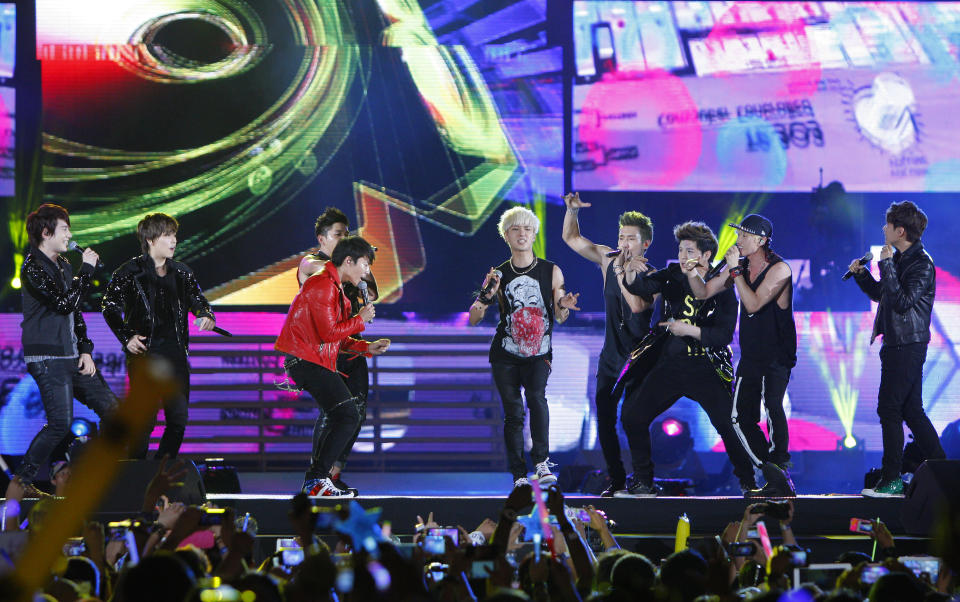 South Korean boy group Super Junior performs during the 27th Golden Disk Awards in Sepang, Malaysia, Tuesday, Jan. 15, 2013. (AP Photo/Lai Seng Sin)