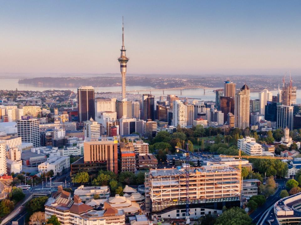 Aerial View Of Auckland City's skyline in New Zealand at sunrise