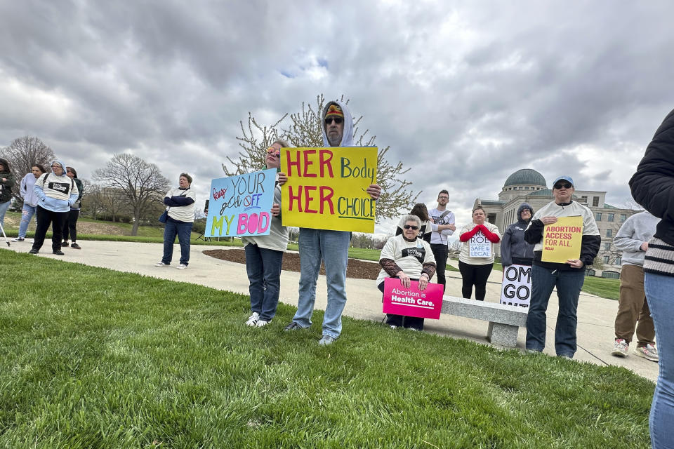 Iowans supporting access to abortion rally on Thursday, April 11, 2024, outside the courthouse in Des Moines, Iowa, where the Iowa Supreme Court heard arguments on the state's restrictive abortion law. The law that bans most abortions after about six weeks of pregnancy is on hold as the courts assess its constitutionality. (AP Photo/Hannah Fingerhut)
