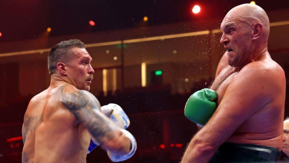 Oleksandr Usyk prepares to throw a punch at Tyson Fury