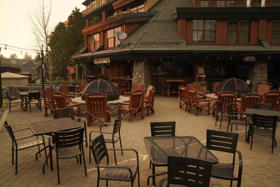 An empty restaurant is seen after a mandatory evacuation was ordered due to the Caldor fire in South Lake Tahoe.