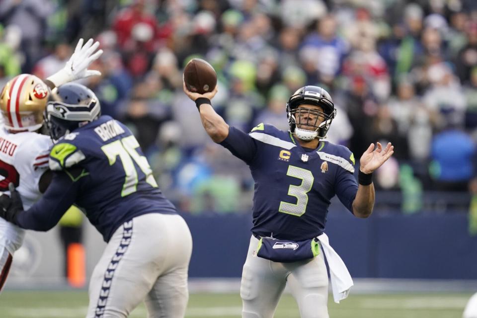 Seattle Seahawks quarterback Russell Wilson throws against the San Francisco 49ers on Dec. 5.