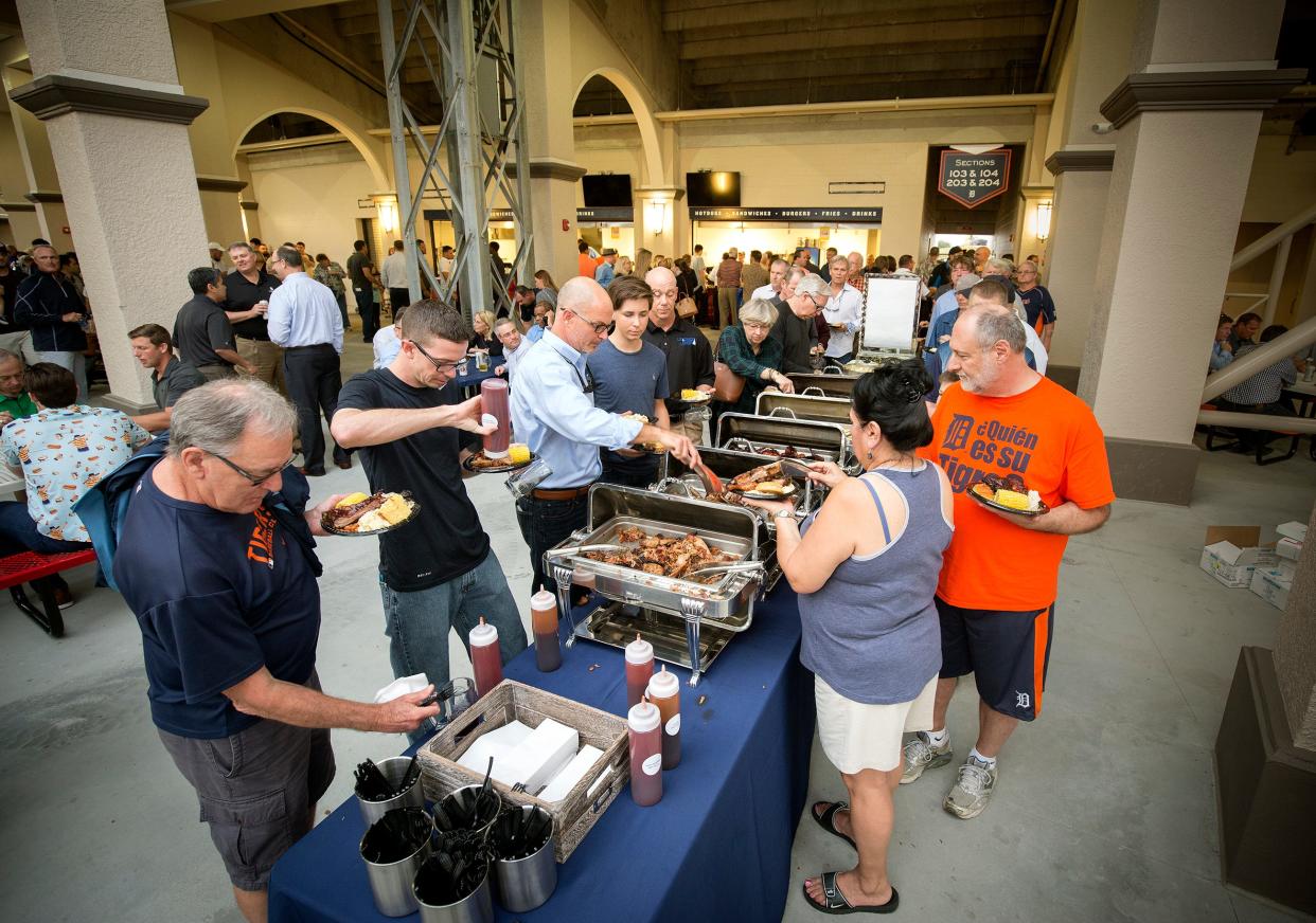 Tigers fans line up for barbeque dinner during the Tiger BBQ at Joker Marchant Stadium in 2017.