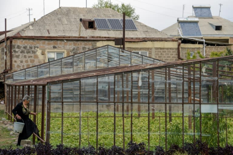 A house with solar panels and solar water heaters on its roof in the village of Lernamerdz, some 40 kilometres northwest of the Armenian capital of Yerevan