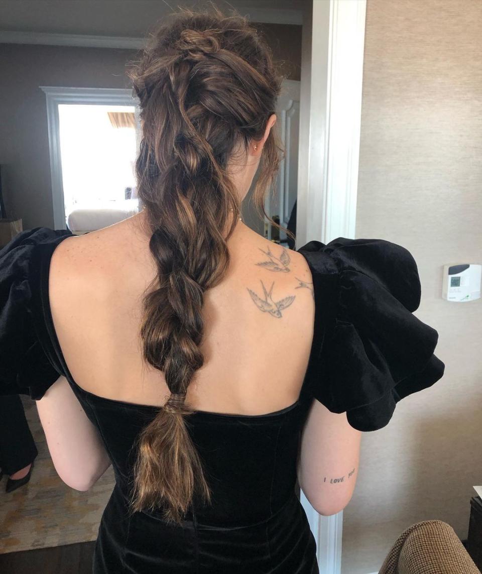 A fluffy braid goes perfectly with a cozy sweater or a fancy party dress. The trick to getting so much volume is working a texturizer through your hair before braiding (hairstylist Mark Townsend used <a href="https://cna.st/affiliate-link/Bmaj1V9t3xBKXRx7yXThBWJneByALpzhb7S6NnGbxiwPCvWm9rngD9r1AK44Hhsab2bhhtPmsuztkannVAvjvwCgVXSuzjc7r2nfPodFgGW3aK84Kct3uLnvCSMHHkojobSTh7QKf7NZAMRpsr65nBTBWxq4Gn2ijB89kf8m?cid=61782990d30bcaf16b62e67f" rel="nofollow noopener" target="_blank" data-ylk="slk:Dove Volume and Fullness Dry Shampoo" class="link ">Dove Volume and Fullness Dry Shampoo</a> in this braid on Dakota Johnson).