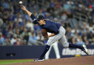 Seattle Mariners pitcher Logan Gilbert works against the Toronto Blue Jays during first inning of a baseball game in Toronto, Wednesday, April 10, 2024. (Nathan Denette/The Canadian Press via AP)