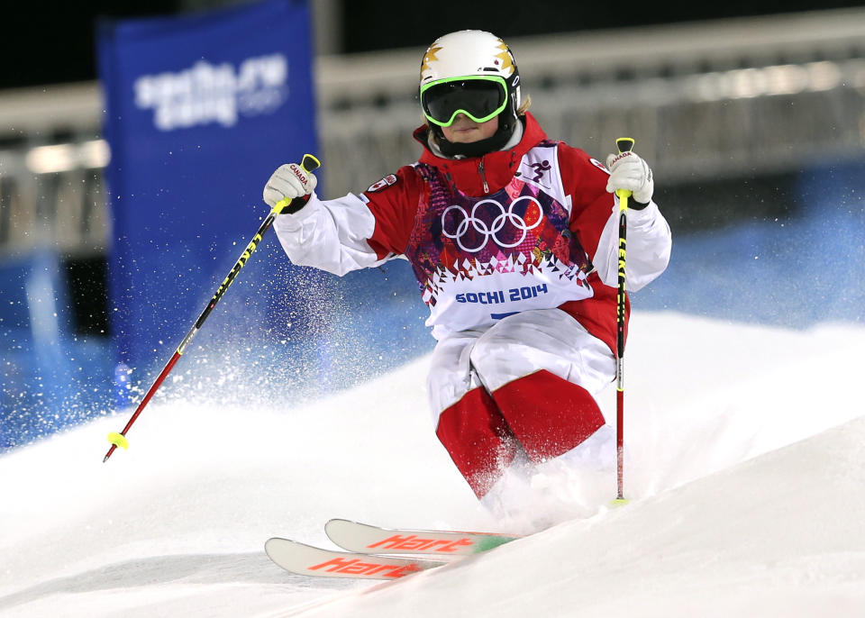 Canada's Chloe Dufour-Lapointe competes in the women's moguls final 1 at the Rosa Khutor Extreme Park, at the 2014 Winter Olympics, Saturday, Feb. 8, 2014, in Krasnaya Polyana, Russia.(AP Photo/Sergei Grits)