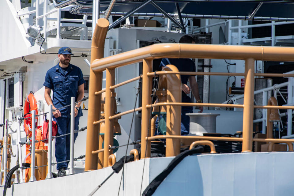 Crews work on Coast Guard vessels at Coast Guard Base Boston in Boston, Massachusetts, on June 21, 2023.<span class="copyright">JOSEPH PREZIOSO—AFP/Getty Images</span>