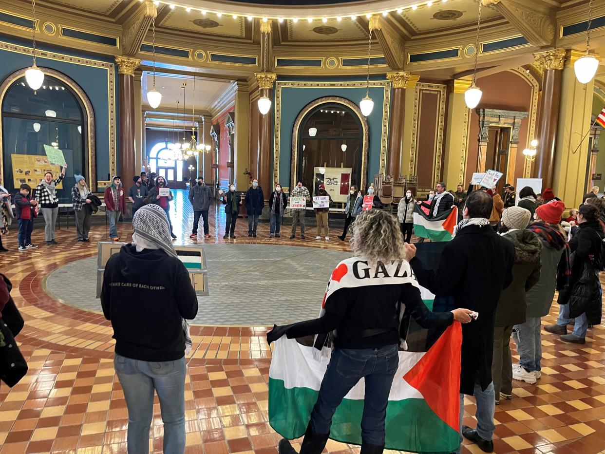 Pro-Palestine protesters chant "ceasefire now" in the Iowa Capitol rotunda on Thursday, Jan. 18, 2024.